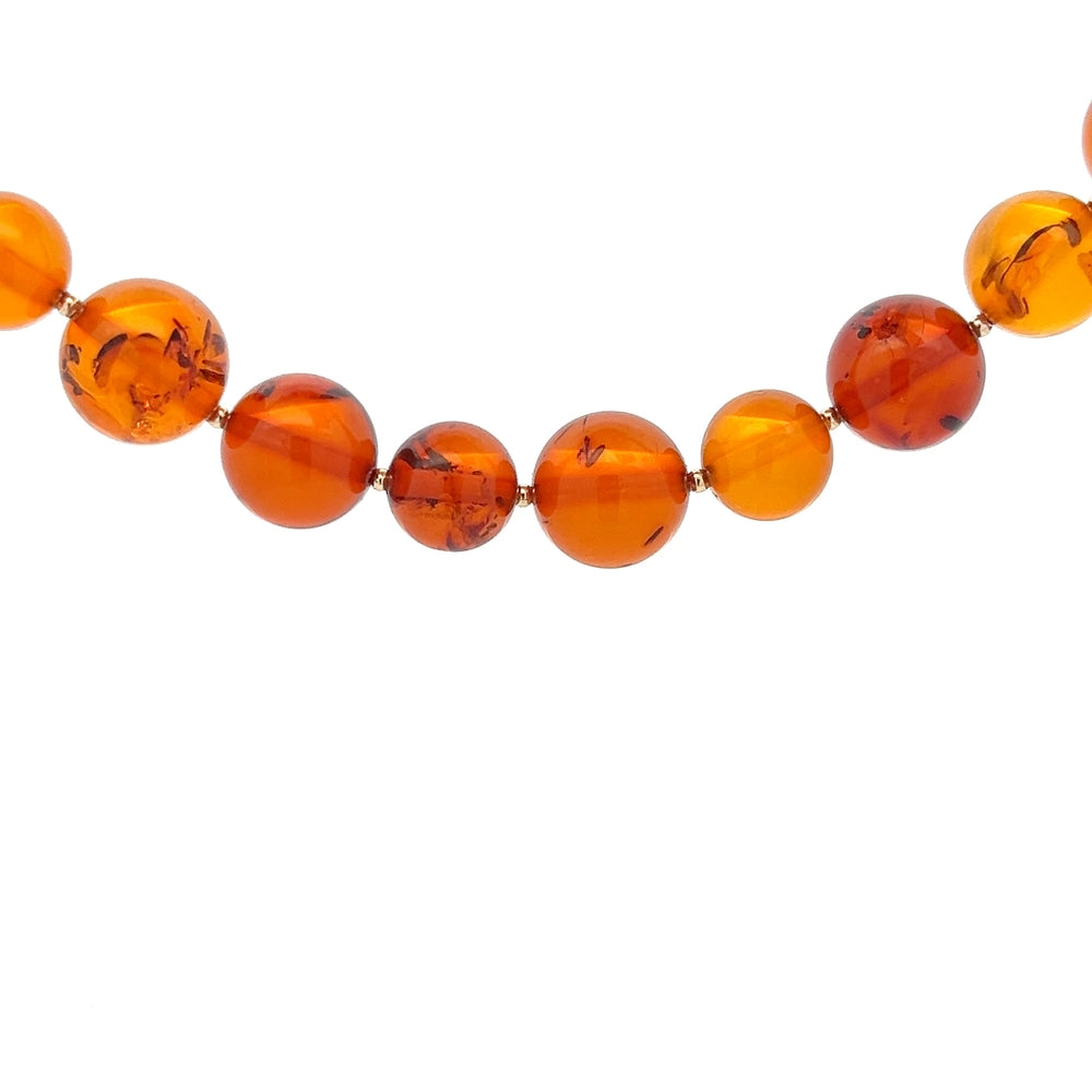 24 Inch Row Of Amber Beads NV £400